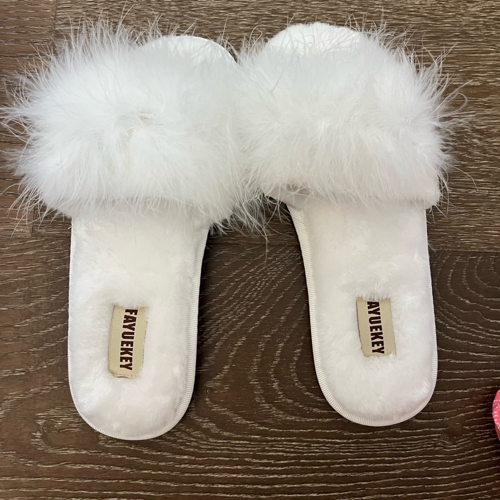Fuzzy white slippers